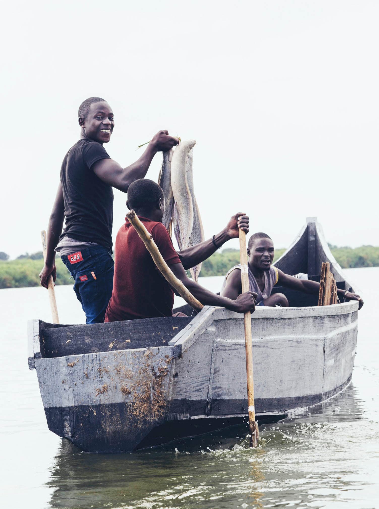 Fishers at work in a boat